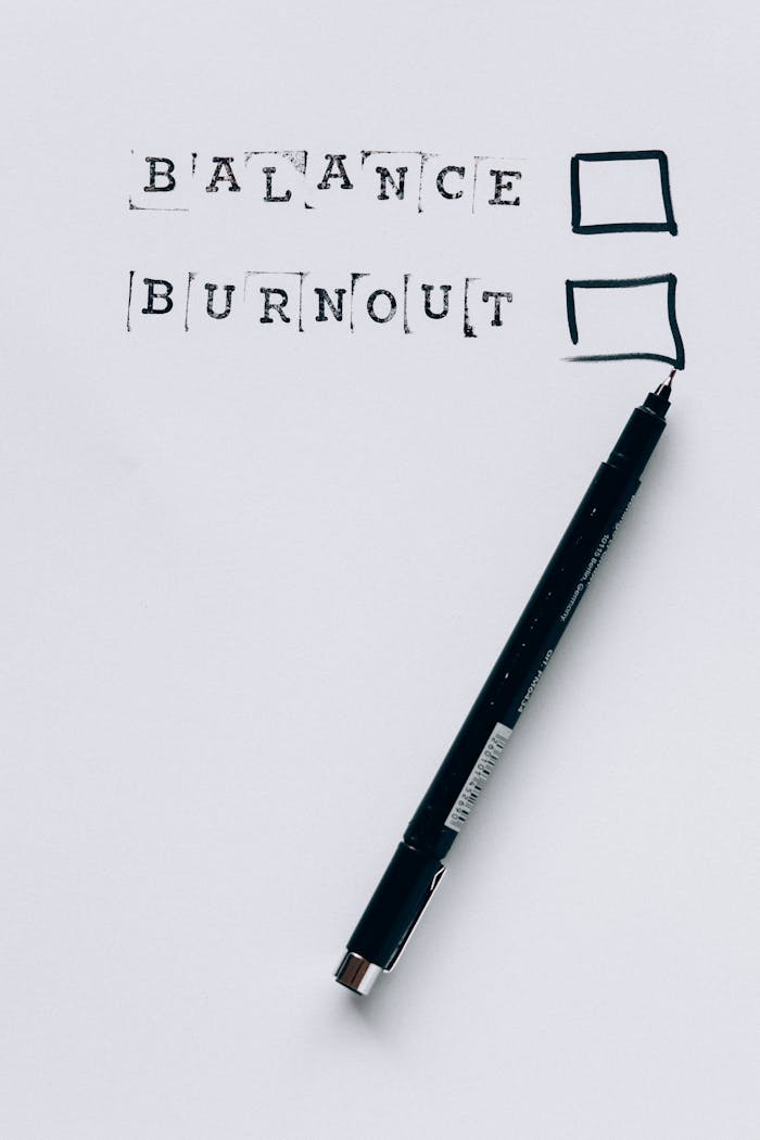 Services A pen beside checkboxes labeled Balance and Burnout. Choose wisely.